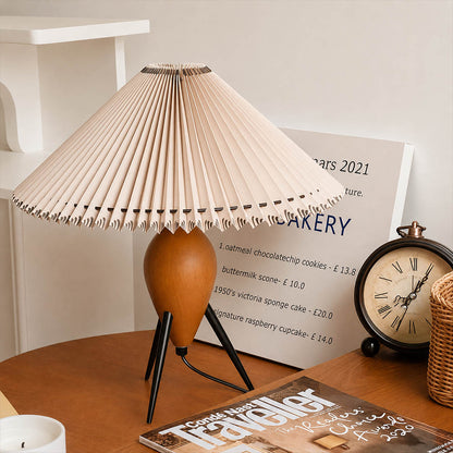 Legno table lamp modern primary bedroom dressing table vanity tripod burl wood pleated beige shade Mid Century Modern warm ambient morning routine feminine lifestyle interior American home