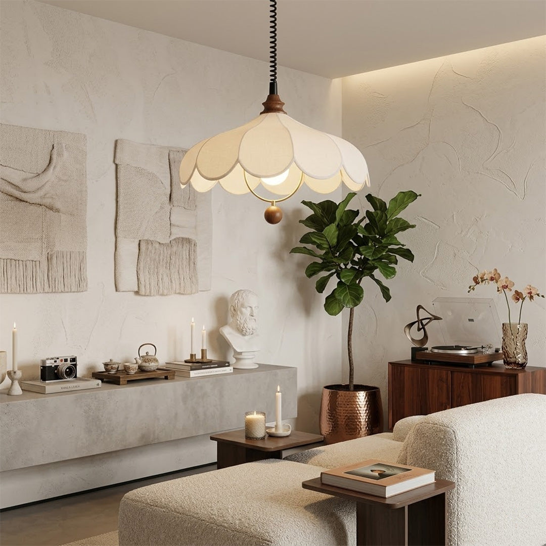 Linen drum pendant light above bedroom or living room warm ambient glow