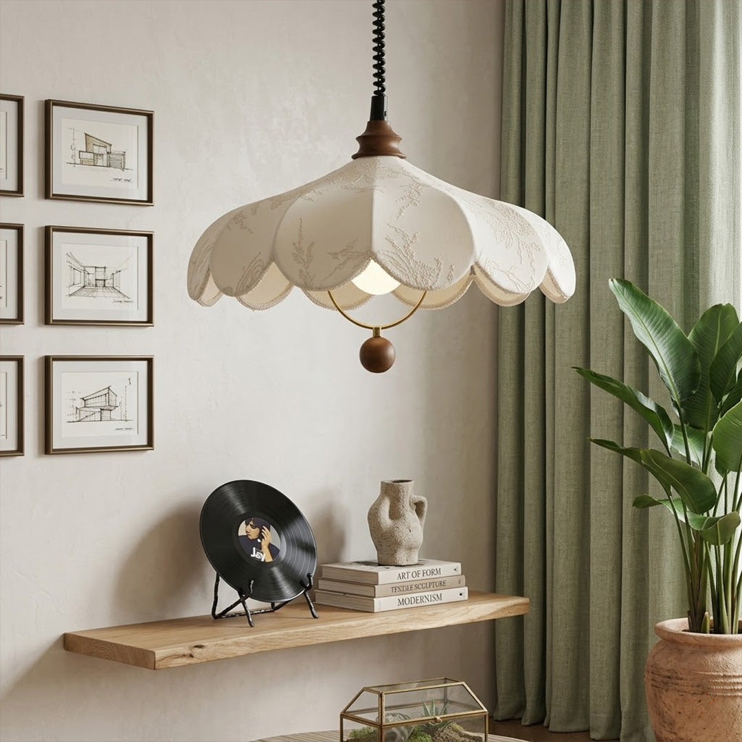 Linen drum pendant light above bedroom or living room warm ambient glow