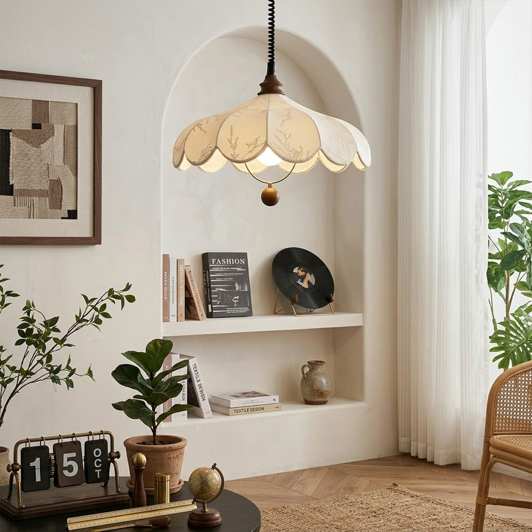Linen drum pendant light above bedroom or living room warm ambient glow