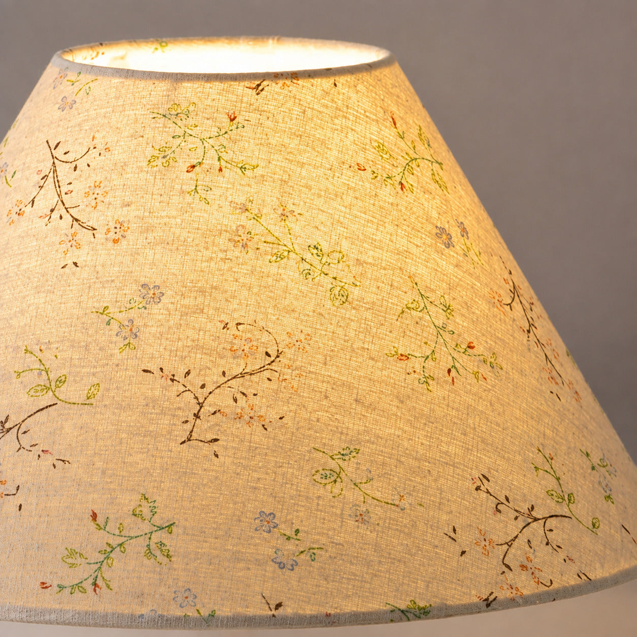 Linnea fabric table lamp fabric shade warm diffused ambient glow soft light detail close up cozy