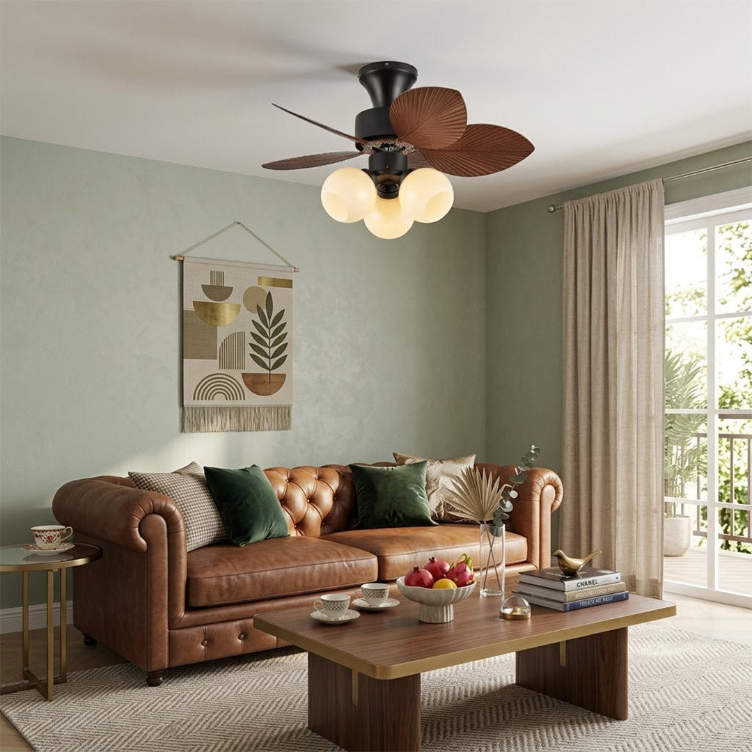 Lotus vintage ceiling fan-A with light above bed warm glass shade glow bedroom interior