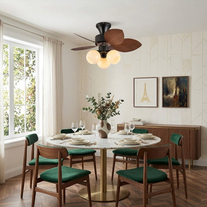 Lotus vintage ceiling fan-A with light above bed warm glass shade glow bedroom interior