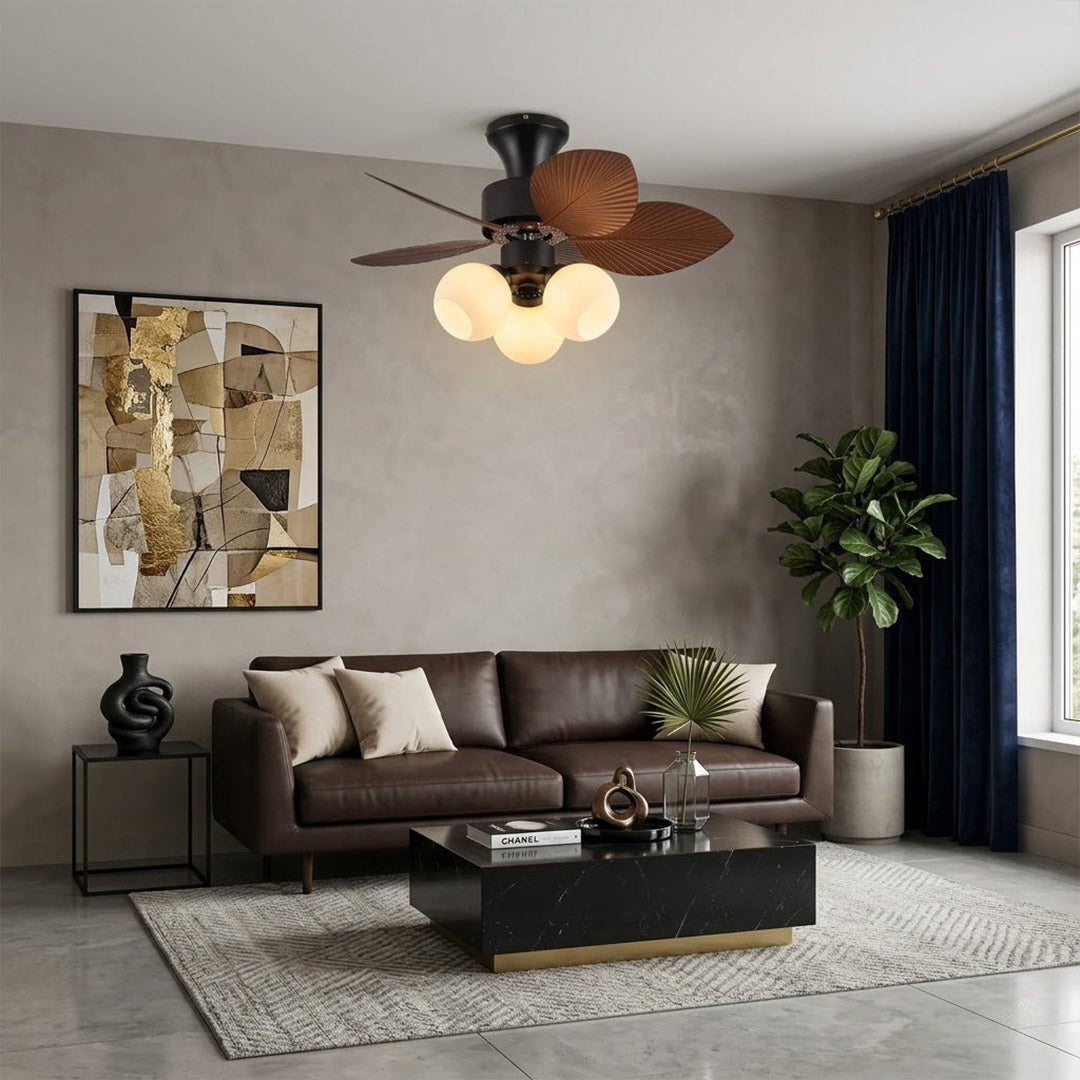 Lotus vintage ceiling fan-A with light above bed warm glass shade glow bedroom interior