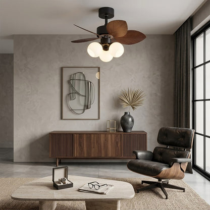 Lotus vintage ceiling fan with light above bed warm glass shade glow bedroom interior