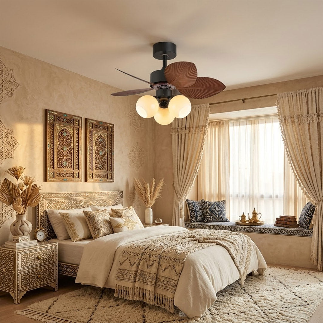 Lotus vintage ceiling fan with light above bed warm glass shade glow bedroom interior