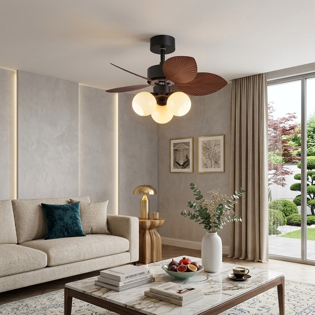 Lotus vintage ceiling fan with light above bed warm glass shade glow bedroom interior