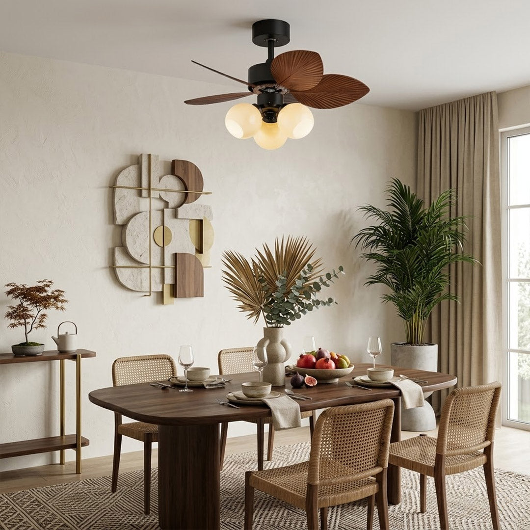 Lotus vintage ceiling fan with light above bed warm glass shade glow bedroom interior