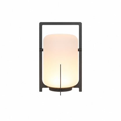 Small 11-inch black Lucciola rechargeable lantern with a durable PE shade on a patio ledge