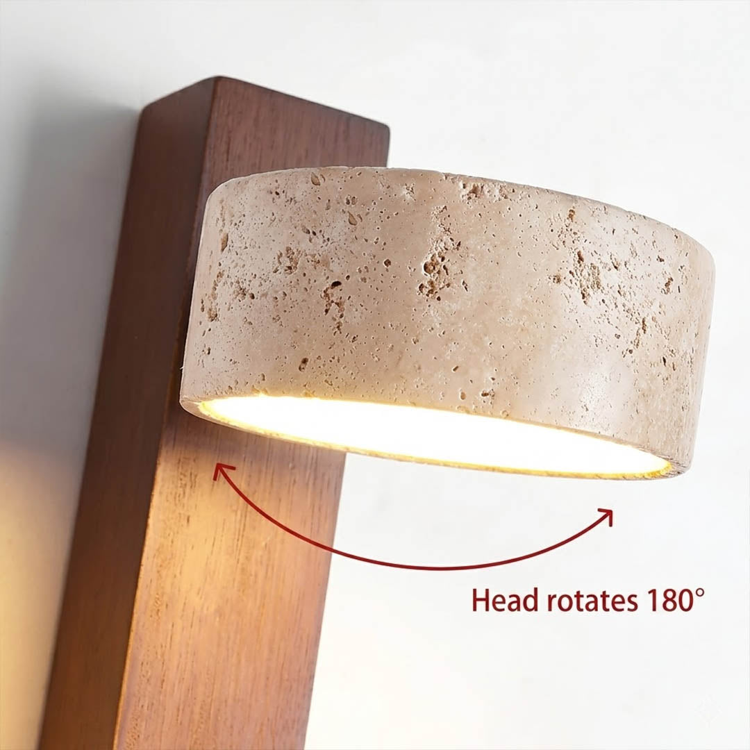 Lumen wall lamp yellow travertine stone lit natural veining detail close up