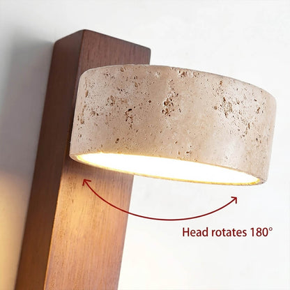 Lumen wall lamp yellow travertine stone lit natural veining detail close up