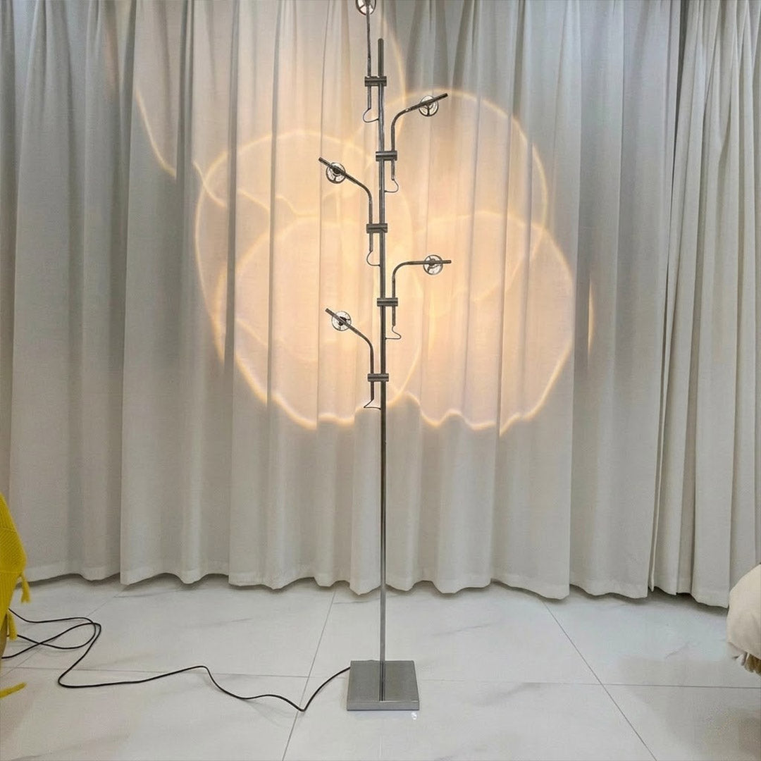 Lumi cordless slim floor lamp standing in modern living room corner warm white glow minimalist neutral interior