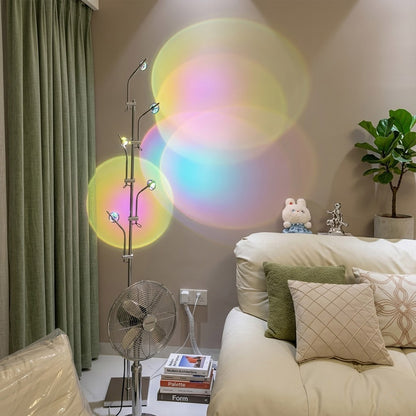 Lumi slim cordless floor lamp behind sectional sofa narrow gap living room ambient warm light modern interior