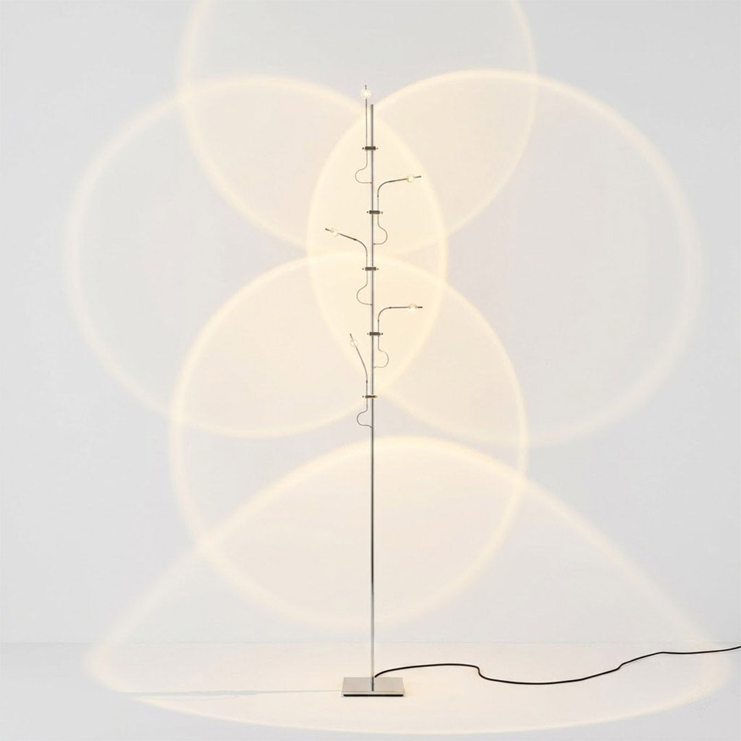 Lumi cordless slim floor lamp 62 inch chrome base transparent glass tube integrated LED minimalist white background