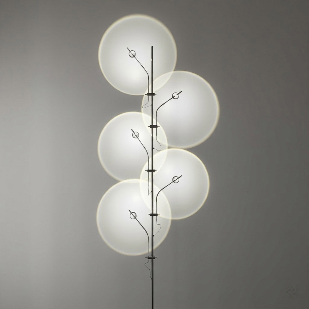 Lumi chrome plated stainless steel base transparent glass tube close up minimalist modern craftsmanship detail