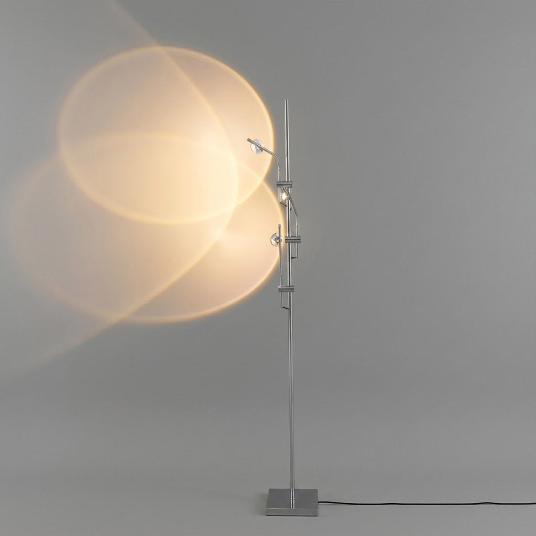 Lumi cordless slim floor lamp 62 inch chrome base transparent glass tube integrated LED minimalist white background