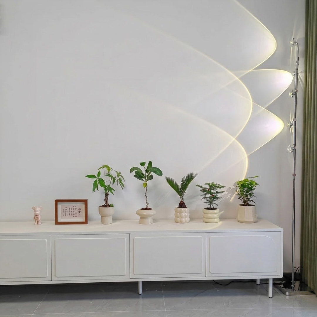 Lumi cordless slim floor lamp standing in modern living room corner warm white glow minimalist neutral interior
