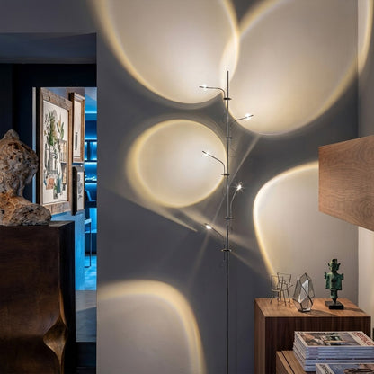 Lumi slim floor lamp standing at end of narrow hallway vertical glass tube ambient light modern minimalist interior