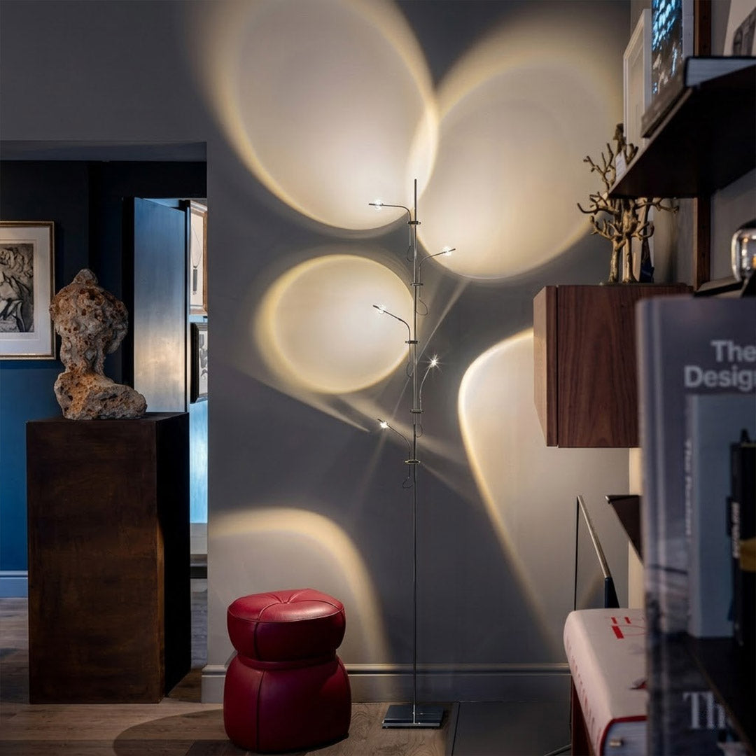 Lumi cordless slim floor lamp standing in modern living room corner warm white glow minimalist neutral interior