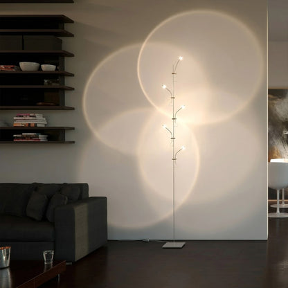 Lumi cordless slim floor lamp standing in modern living room corner warm white glow minimalist neutral interior