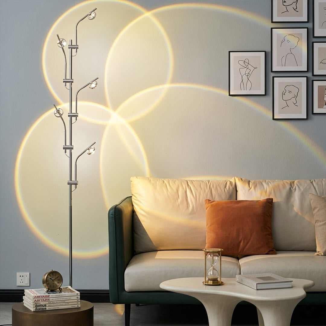 Lumi slim cordless floor lamp behind sectional sofa narrow gap living room ambient warm light modern interior
