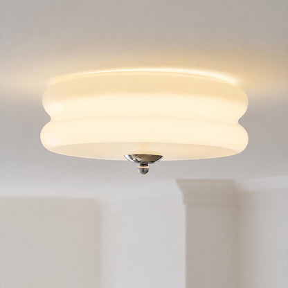 Lumiere deco ceiling light tiered stepped disc art deco geometric structure ribbed glass 1920s design detail close up unique