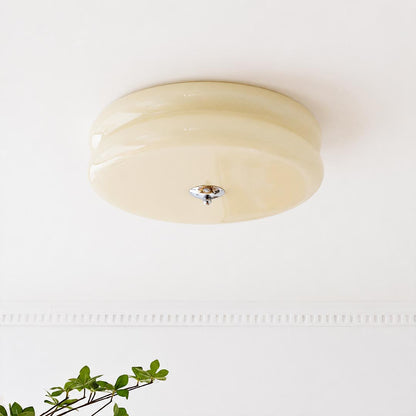 Lumiere deco ceiling light ribbed fluted glass shade texture warm diffused light craftsmanship detail close up