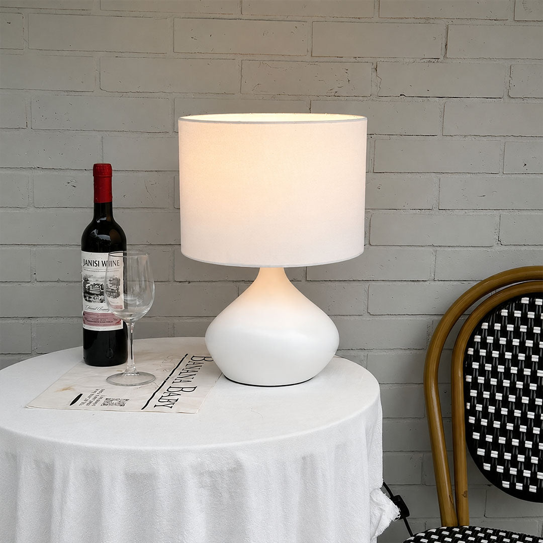 Terra ceramic table lamp living room side table warm glow ceramic fabric elegant American home lifestyle interior styled
