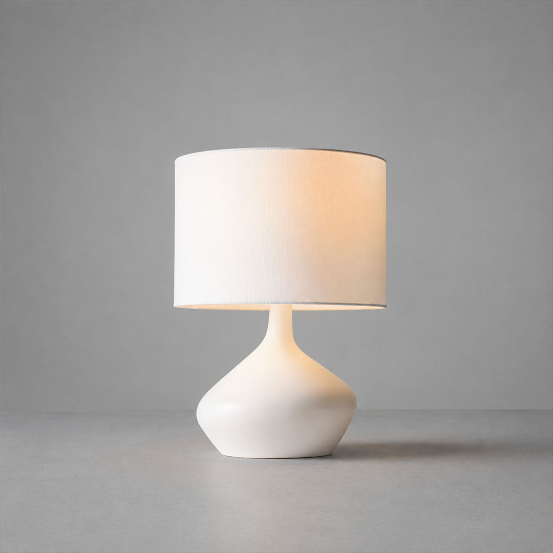 Terra ceramic table lamp white ceramic base white fabric shade handcrafted minimalist white background front view