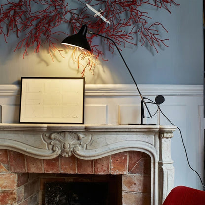 Lyra table lamp on living room console sideboard sculptural statement piece matte black mid century interior