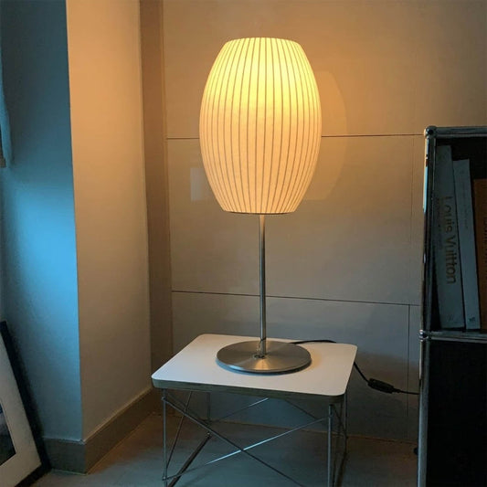 Maeve Model A tall chrome faux silk console lamp 29 inch sofa side living room mid century modern warm glow interior