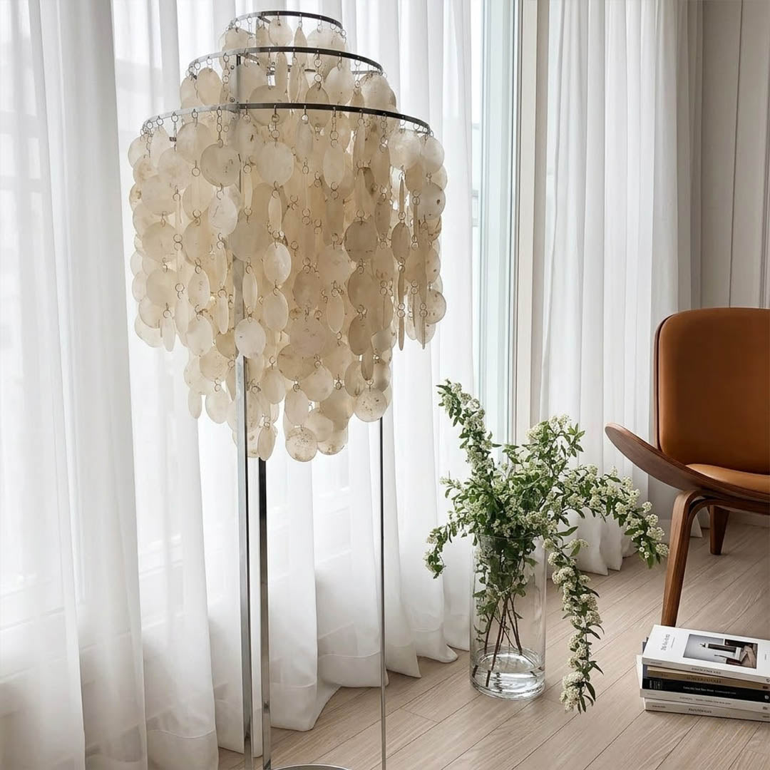 Marina Gold Capiz shell floor lamp beach house living room corner Coastal Hampton white wood interior warm glow natural lifestyle