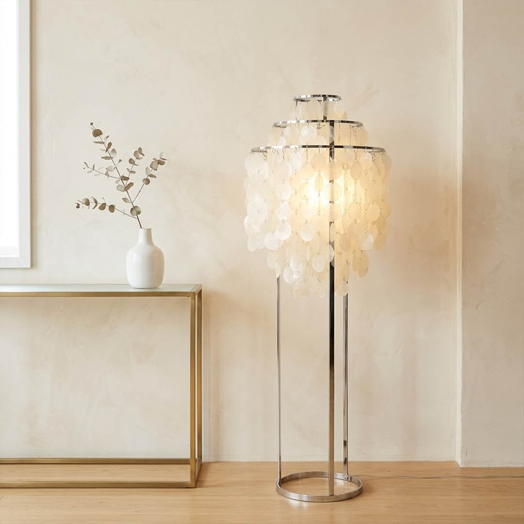Marina Gold Capiz shell floor lamp beach house living room corner Coastal Hampton white wood interior warm glow natural lifestyle