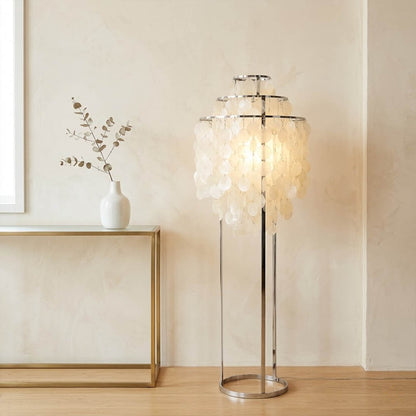 Marina Gold Capiz shell floor lamp beach house living room corner Coastal Hampton white wood interior warm glow natural lifestyle