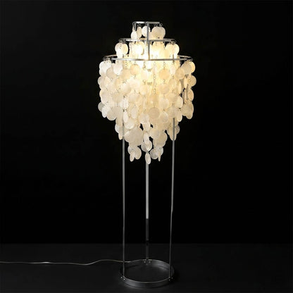 Marina illuminated Capiz shells warm 2700K glow evening atmosphere pearl iridescent Coastal Boho detail close up