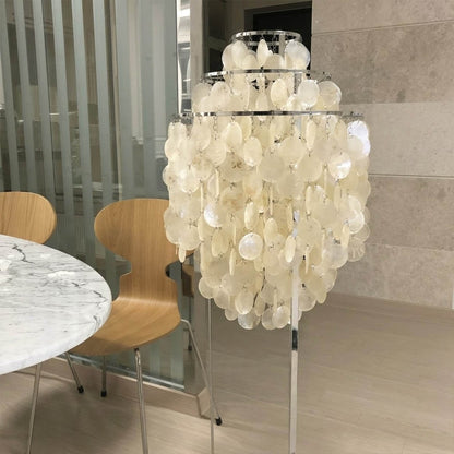 Marina Gold Capiz shell floor lamp beach house living room corner Coastal Hampton white wood interior warm glow natural lifestyle