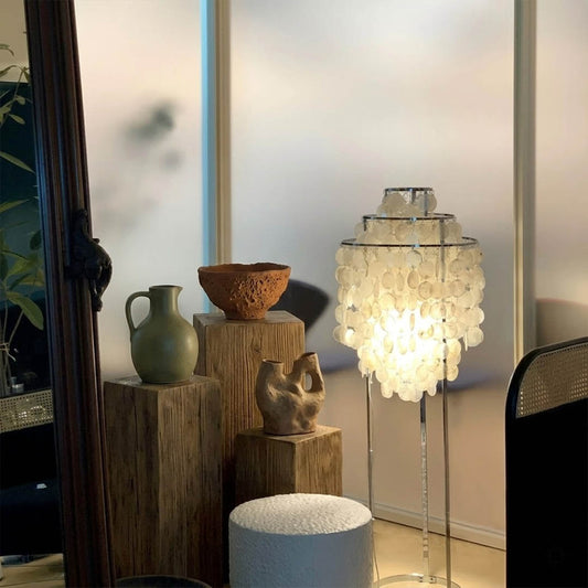 Marina Gold Capiz shell floor lamp beach house living room corner Coastal Hampton white wood interior warm glow natural lifestyle