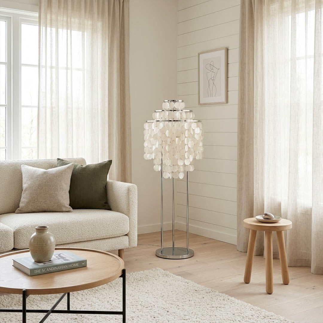 Marina Gold Capiz shell floor lamp sofa side accent placement Coastal modern living room warm pearl glow lifestyle