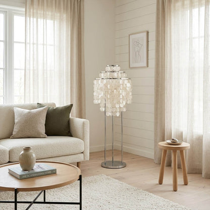 Marina Gold Capiz shell floor lamp sofa side accent placement Coastal modern living room warm pearl glow lifestyle