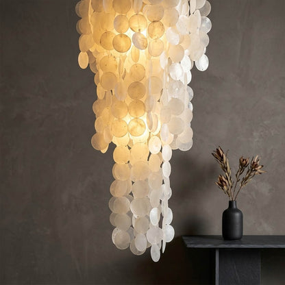 Marisa fluid curved cord gold suspension detail Asian inspired structure spontaneity Japandi minimalist design close up