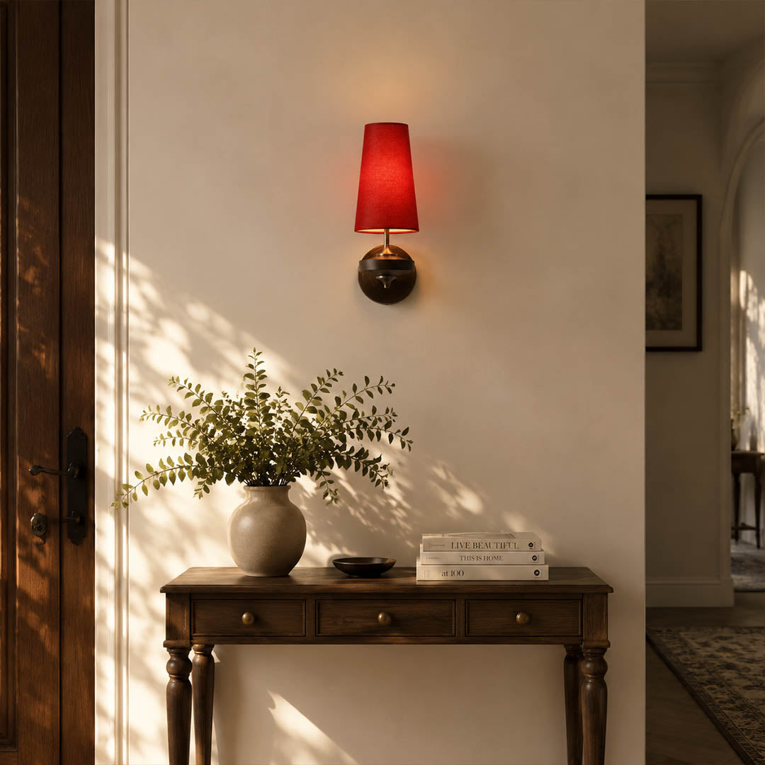 Marnie twin shade wall sconce entryway foyer illuminated warm glow mid-century bronze walnut welcoming American home lifestyle interior