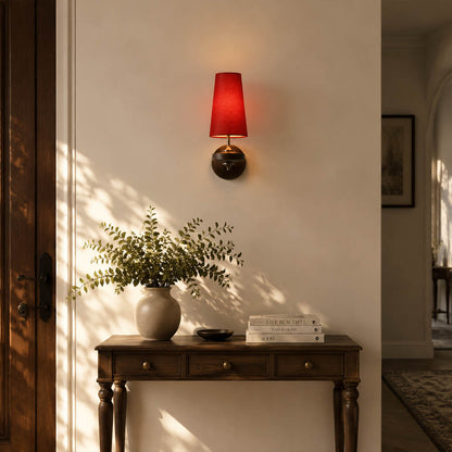 Marnie twin shade wall sconce entryway foyer illuminated warm glow mid-century bronze walnut welcoming American home lifestyle interior