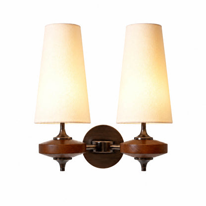 Marnie twin shade wall sconce white fabric bronze walnut wood mid-century two tapered shades symmetrical white background front view