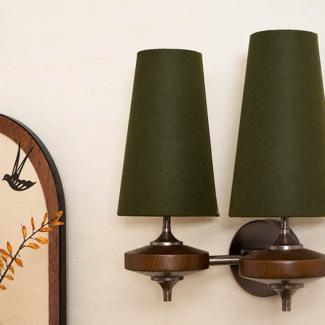 Marnie wall sconce living room sofa side wall mid-century fabric shade bronze walnut warm ambient American home lifestyle interior