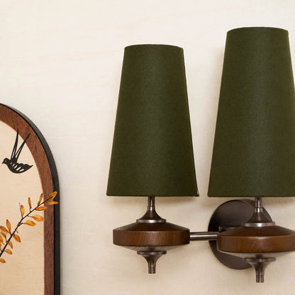 Marnie wall sconce living room sofa side wall mid-century fabric shade bronze walnut warm ambient American home lifestyle interior