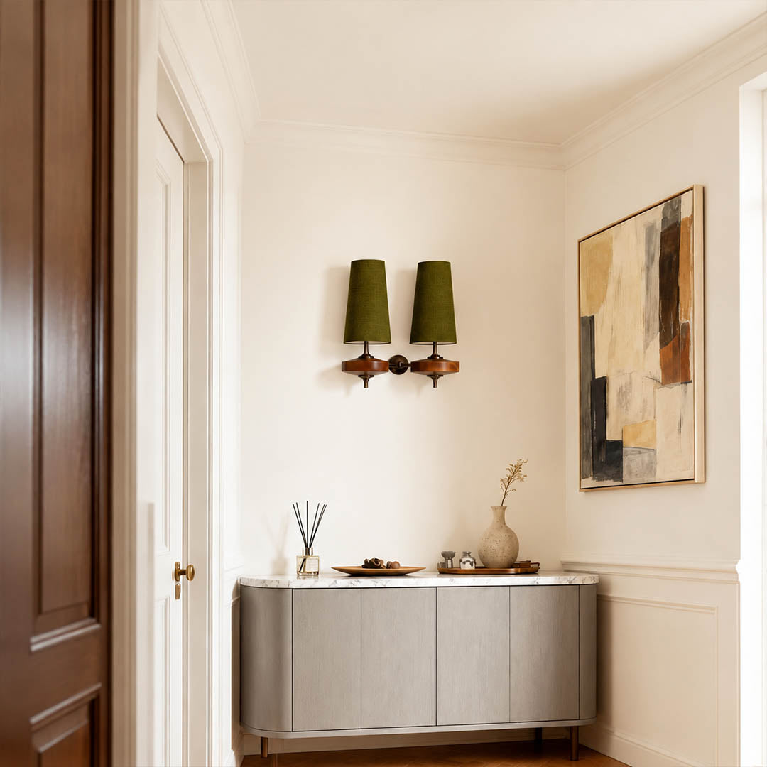 Marnie twin shade wall sconce entryway foyer illuminated warm glow mid-century bronze walnut welcoming American home lifestyle interior