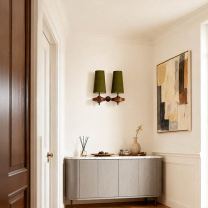 Marnie twin shade wall sconce entryway foyer illuminated warm glow mid-century bronze walnut welcoming American home lifestyle interior