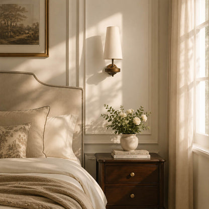 Marnie wall sconce bedside single light reading nook warm fabric shade walnut bronze cozy American home lifestyle interior