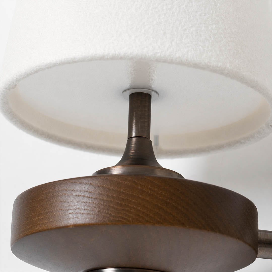Marnie wall sconce walnut wood base natural grain warm finish detail close up mid-century craftsmanship
