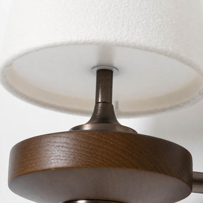 Marnie wall sconce walnut wood base natural grain warm finish detail close up mid-century craftsmanship